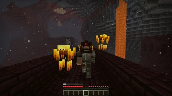 Игрок в шлеме рядом с ифритами