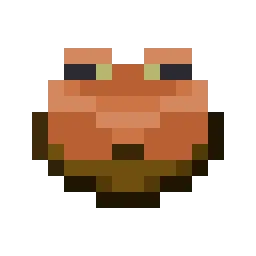 Оранжевая лягушка в миске