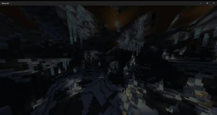 Глубокая подземная пещера с ледяными стенами и сталактитами