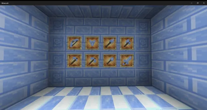 Предметы, изготовленные из льда, размещённые в рамках на стене