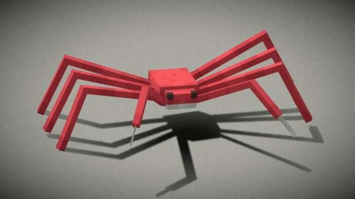 Ярко-красное существо, напоминающее агрессивного паука