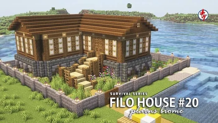 Дом на берегу реки, окруженный забором