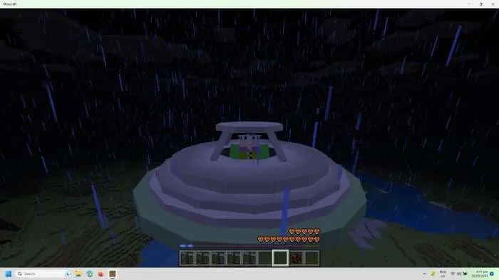 Игрок управляет НЛО, паря над игровым ландшафтом