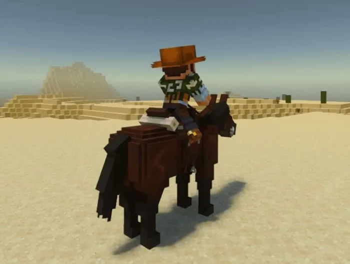 Игрок в пустыне верхом на коне