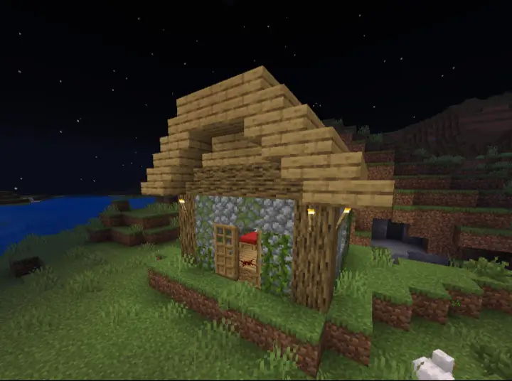 Заброшенный дом с красной кроватью возле реки