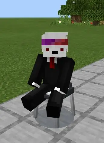 Игрок сидят на барном стуле