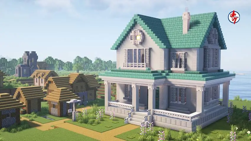 Белый двухэтажный дом рядом с деревней