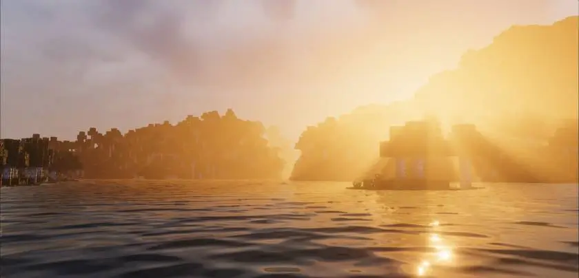 Яркий рассвет над волнами озера