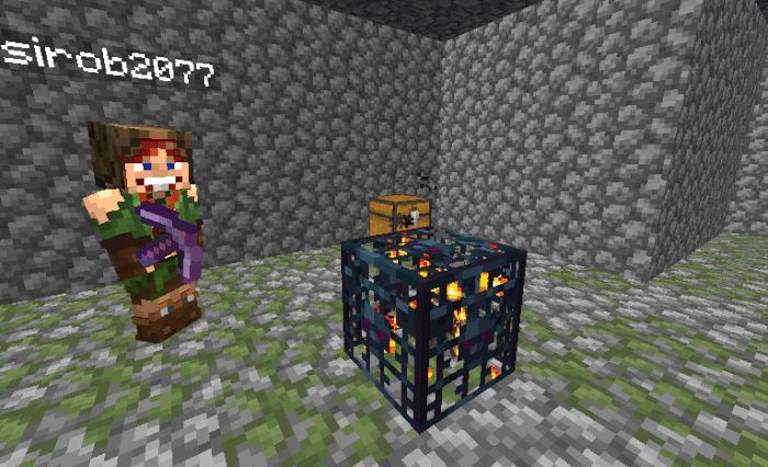 Игрок добывает спаунер с помощью кирки