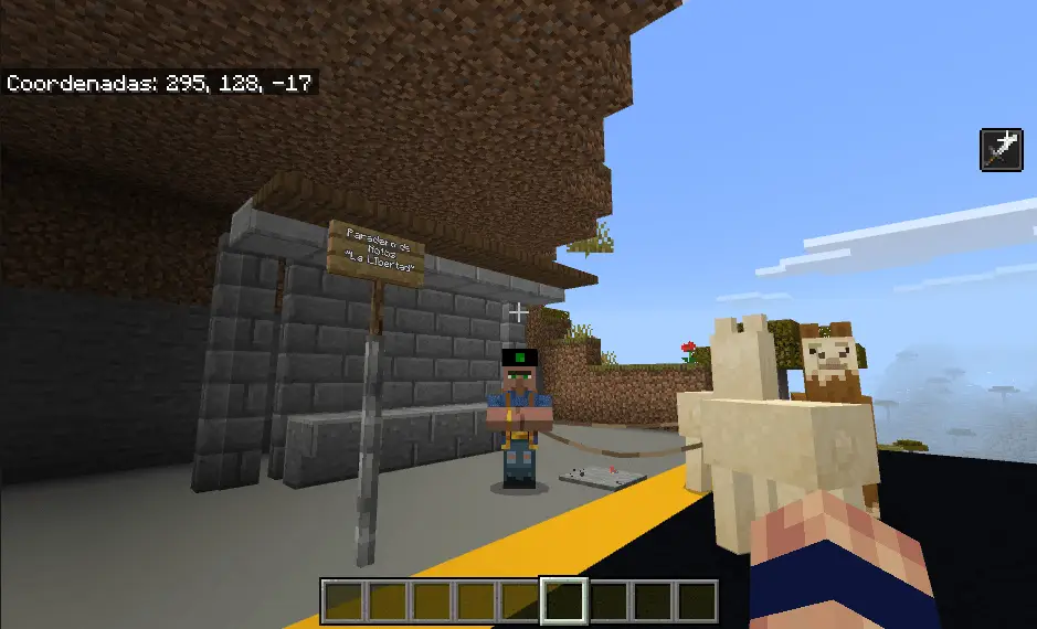 Новый торговец с двумя ламами у каменного сооружения