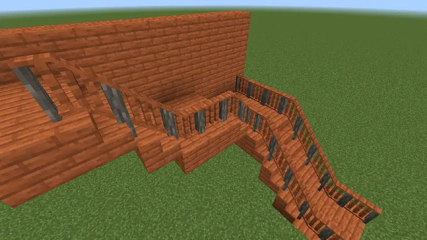 Перила из акации на лестнице с поворотом