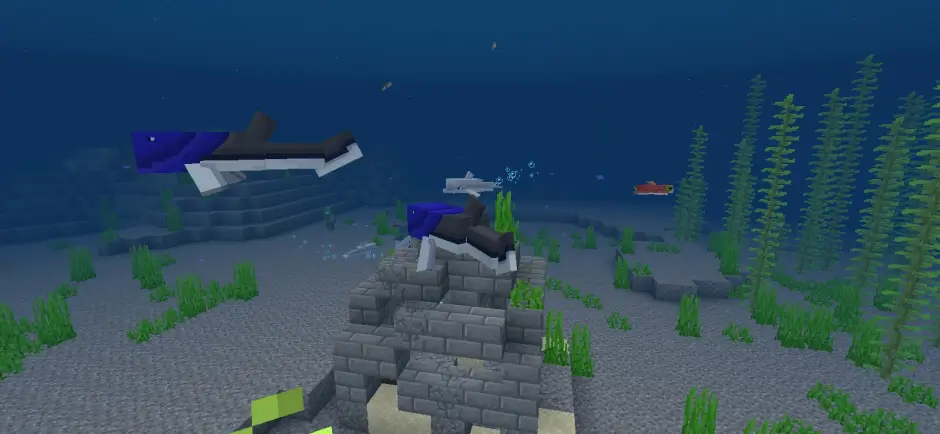 Акулы около руин