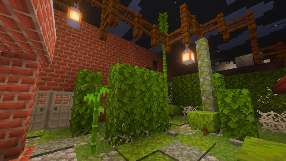 Кусты и дом из кирпичей