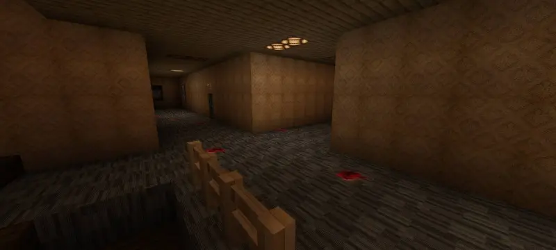 Длинный коридор с развилкой и пятнами крови