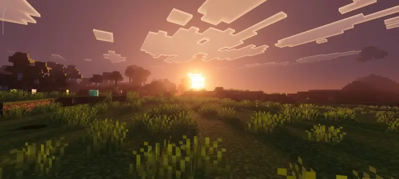 Яркий закат над долиной и лесом