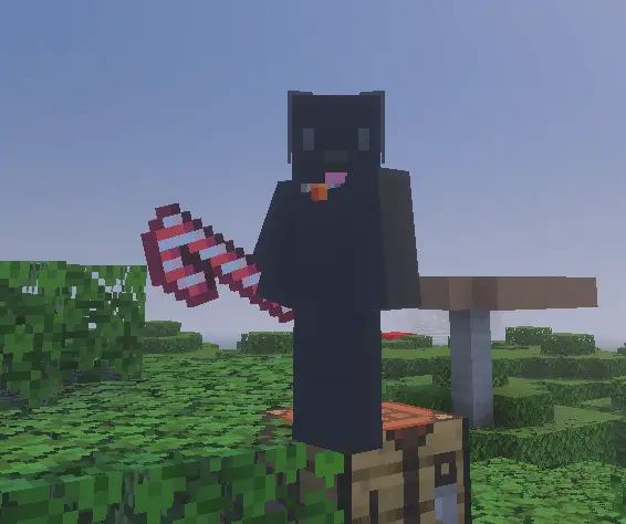 Карамельная палочка в руке