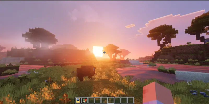 Яркий закат над саванной и рекой