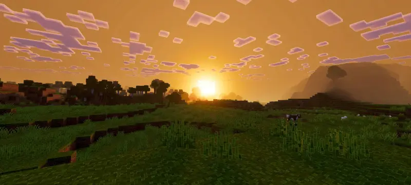 Яркий закат над долиной и лесом