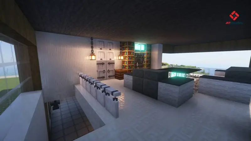 Гостиная в белых оттенках с книжными полками