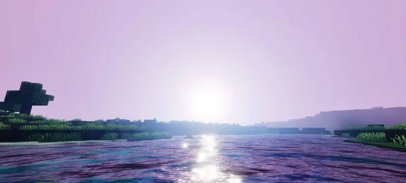 Солнце на розовом небе над рекой