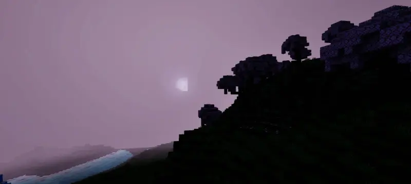 Мутное розовое небо над темным лесом